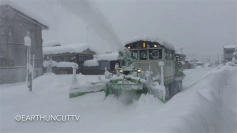 Snow Clearing Train Churns Through Drifts In Japan Youtube