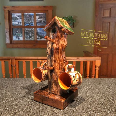 Your mugs stand stock images are ready. Coffee mug stand,Coffee Tea Bar,Faux Wood Birdhouse mug ...