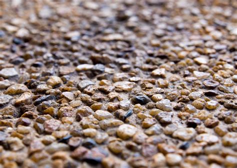 After the concrete has taken it's initial set a special retardant is applied to etch away the. Enhance Surfaces with Exposed Aggregate - Driveways ...