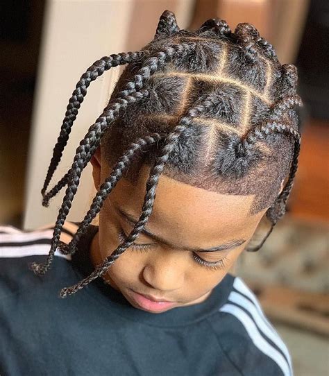 The longer the hair on top is, the shorter it should be on the. Black Boys Haircuts: 86 Fancy Hairstyle ideas for Black ...