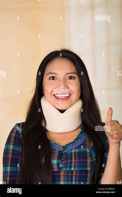 Headshot Young Hispanic Woman Posing Wearing Neck Brace Smiling