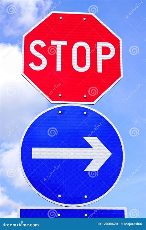 Stop Sign And Arrow Traffic Sign Stock Image Image Of Street Lane