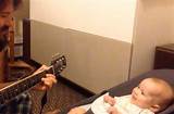 Pictures of Baby Singing With Dad Playing Guitar