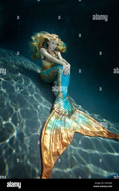 Mermaid Sitting On The Ground Underwater Stock Photo 47748335 Alamy