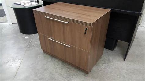 Modern file cabinets add essential organization to your workspace, whether it be the home office or company headquarters. Modern Walnut Lateral File Filing Cabinet | Madison ...