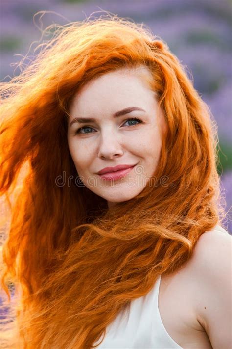 Summer Portrait Of A Beautiful Girl With Long Curly Red Hair Stock Image Image Of Nature