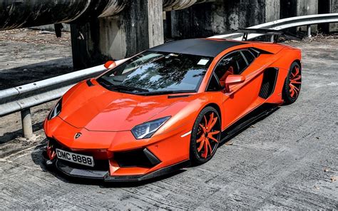 Designed to push beyond performance revolutionary thinking is at the heart of every idea from automobili. Orange Lamborghini Aventador Lp900