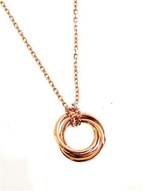 Yellow gold rose gold white gold silver stainless steel. Cartier Trinity Pink Sapphire Necklace in Rose Gold at 1stdibs