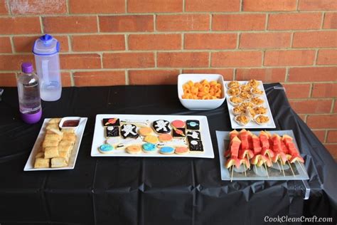 Using silver liners for cupcakes or to hold small snacks, for example, can give a futuristic feel to any treat. Space-Themed Birthday Party Food | Cook Clean Craft