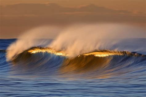 Gorgeous Long Exposure Photographs Of Golden Waves