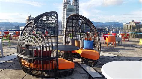 While helicopters and powered lift aircraft are able to operate on a variety of relatively flat surfaces, a fabricated helipad provides a clearly marked hard surface away from obstacles where such aircraft can land safely. Rooftop bars in KL