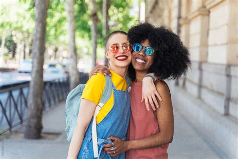 Beautiful Lesbian Couple Having Fun At The Street By Stocksy