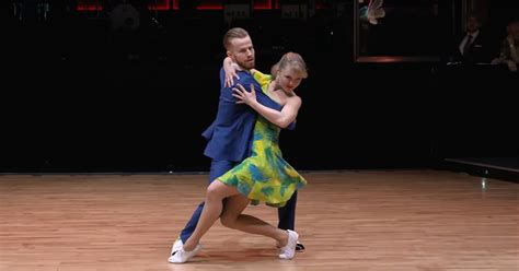 Energetic Couple Shine On Dance Floor With Swingin Routine That