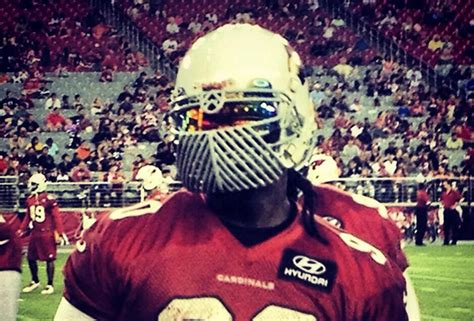 Darnell Dockett Unveils Intimidating Facemask During Cardinals Fanfest