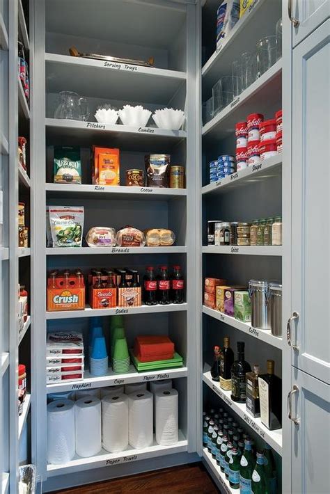 They found themselves cooking on a 30 by 36 tiny island in an area that had much more potential. Walk In pantry with Gray Shelves - Transitional - Kitchen