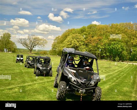 Utv Utility Terrain Vehicles 4x4 Being Driven Off Road At Road