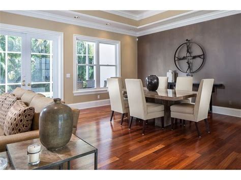 Remember in my last dining room blog post i asked for opinions on what to do with this wall? Neutral Dining Room, White Chairs, Dark Accent Wall ...