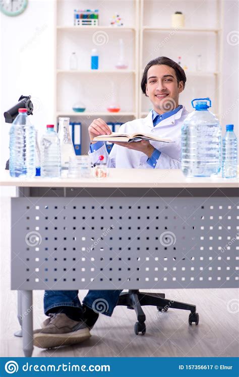 Young Male Chemist Experimenting In Lab Stock Image Image Of Clean