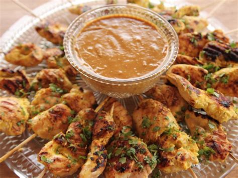 In a small bowl, toss the cucumber slices this helps the chicken to cook more evenly. Chicken Satay with Peanut Sauce Recipe | Ree Drummond ...