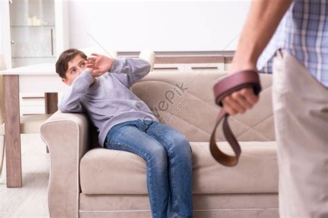 Father Beating And Punishing His Son A Photo Picture And Hd Photos Free Download On Lovepik