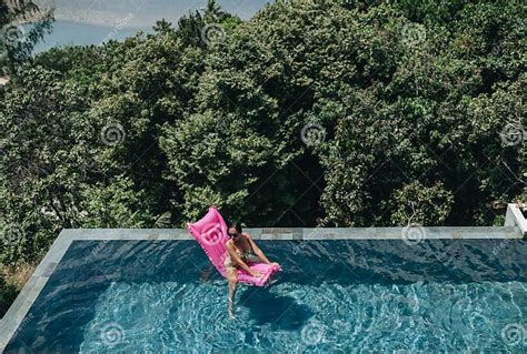 Woman In Bikini Enjoying Summer Sun In Swimming Pool Stock Image
