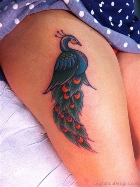 49 Stunning Peacock Tattoos On Thigh Leg Tattoo Designs