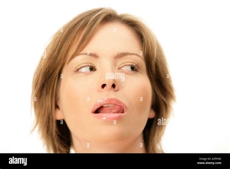 Woman Licking Her Lips Stock Photo Alamy
