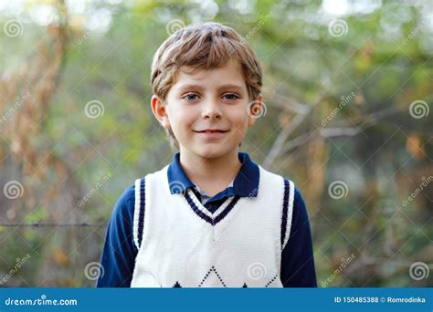 Portrait Of Little Cool Kid Boy In Forest Happy Healthy Child Having