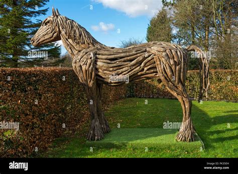 A Wooden Horse Sculpture In A Garden Near Littleborough Greater
