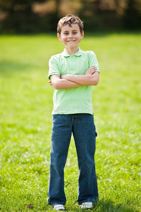 Retrouvez des vêtements unique et originaux pour votre fils, à la dernière mode. 9 years old kid in a park stock photo. Image of happiness ...
