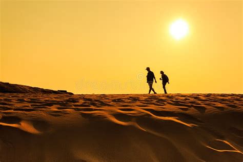 A Man Walking On Sand Desert Stock Image Image Of Landscape Horizon