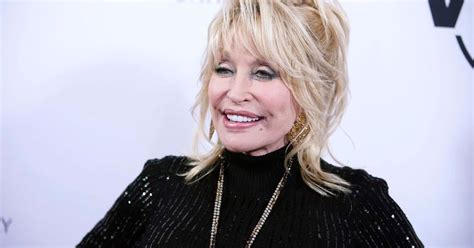 Dolly Parton Got Breast Reduction Surgery Because Her Trademark 40dd