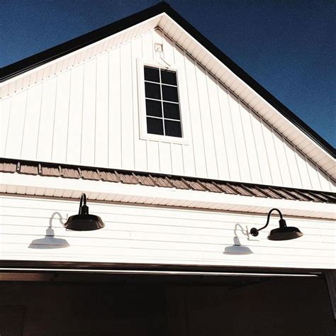 Zinc, copper and steel alloys are commonly used. Farmhouse exterior, barn lights, white siding , black ...
