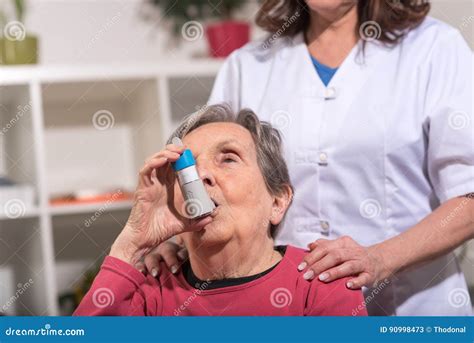 senior woman with asthma inhaler stock image image of treatment inhalation 90998473