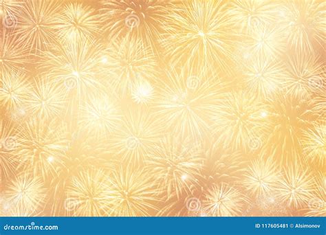 Light Golden Festive Background With Lots Of Fireworks Stock Image