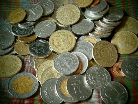 Physics 1011 On The Different Densities Of Philippine Coins