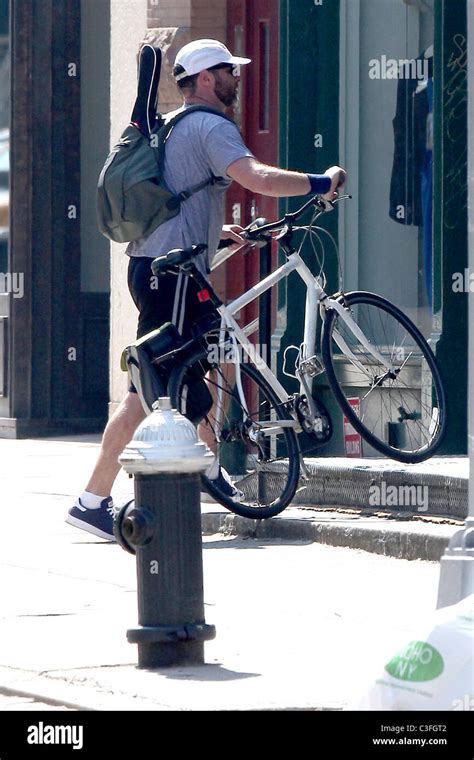 liev schreiber taking woodstock star returning to his home in noho after cycling around town