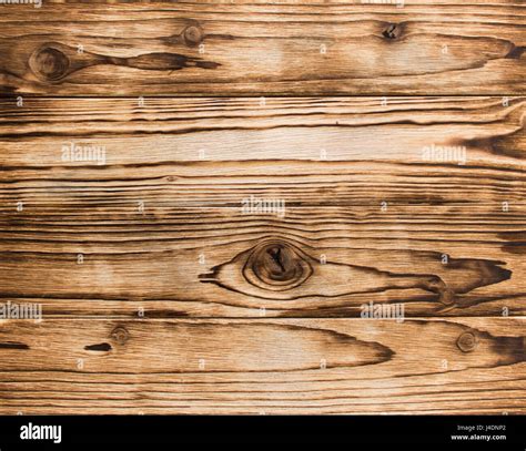 Horizontally Disposed Burnt Wood Boards With Knots Texture Stock Photo