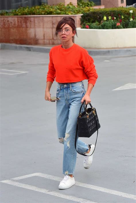 Sarah Hyland Dons A Bright Orange Top While Out Christmas Shopping In Studio City California