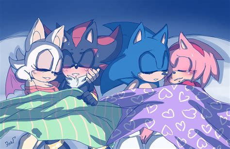 Four Cartoon Characters Wrapped Up In Blankets