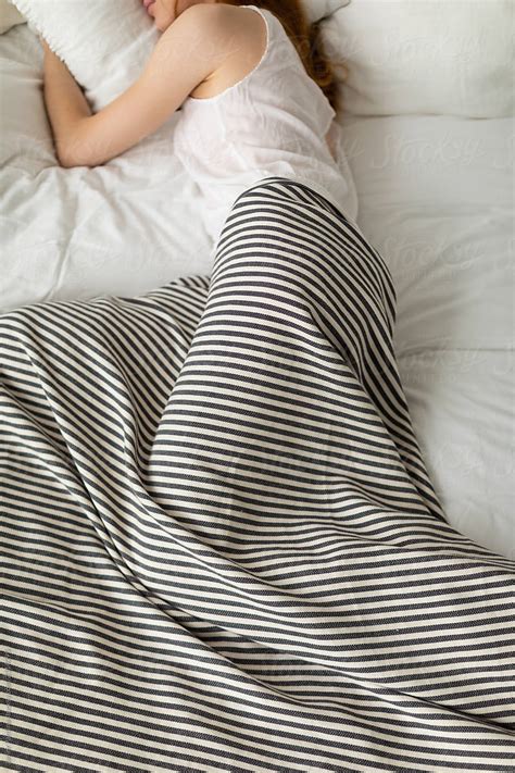 Redhead Woman Sleeping In The Bed Del Colaborador De Stocksy Javier
