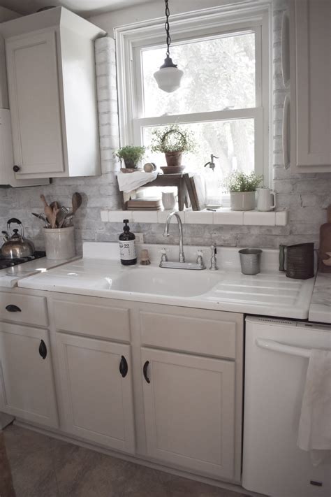 Use the inside of the wrist or the elbow to use safety latches that are available for kitchen cupboards and drawers. Vintage Washboard Kitchen Sink - Midcounty Journal Vintage ...