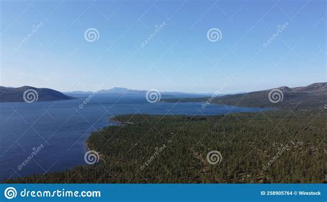 Aerial Drone Shot Of Femunden Lake Norway With A Forest On The Shore