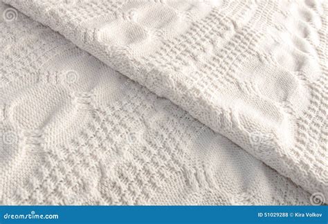 White Knitted Blanket Folded Diagonally Stock Photo Image Of Textile