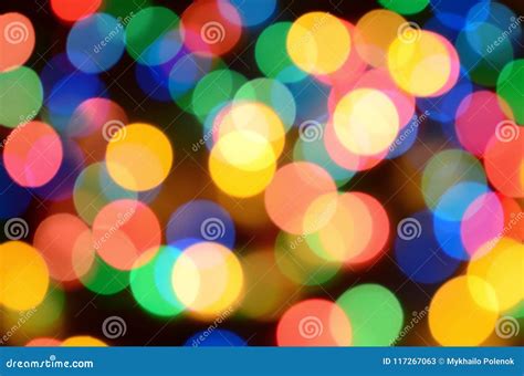 Blurred Festive Colorful Lights Over Black Useful As Background All