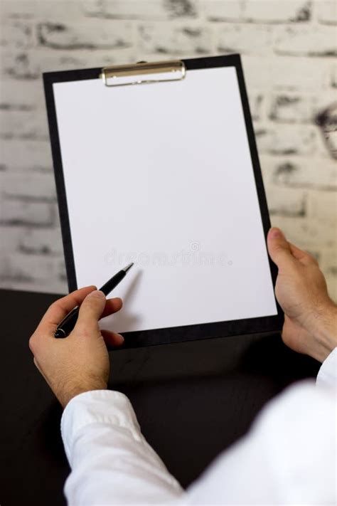 Hands Holding A Clipboard Stock Image Image Of Write 103027811