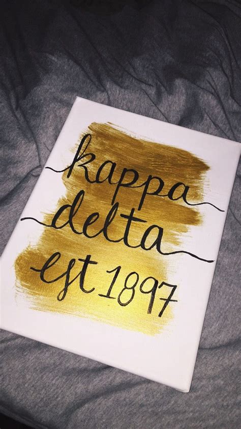 A Sign That Says Kappa Delta Est 1897 On It In Black And Gold Ink