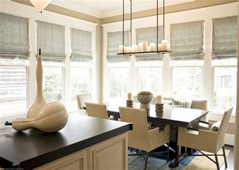 In our luxe lakeview dining room, these plaid panels are decorative, while the sheer inside mount roman shade is functional. Block the Sun with Sophisticated Roman Shades
