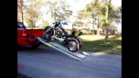 Owning a motorcycle almost guarantees that you will, at some point, have to haul or tow it. Fast Master Motorcycle Truck Bed Pickup Loader - YouTube