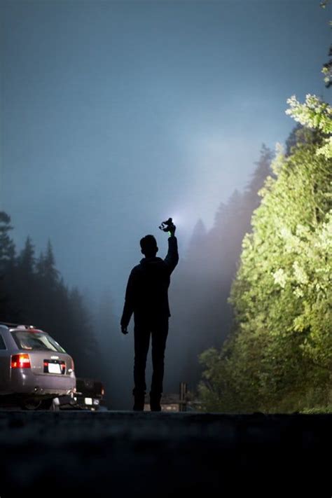 Person Holding Flashlight Photo Unsplash Natural Landmarks
